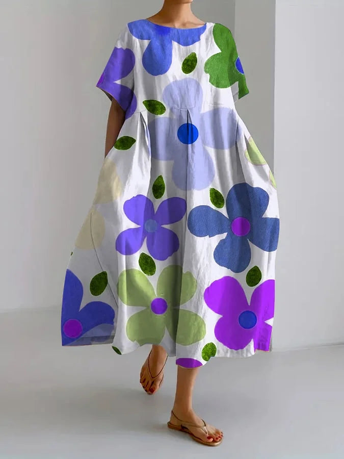 ELIANA | Midi Kjole med Blomsterprint i Afslappet Stil og Sommerkomfort til Farverige Dage